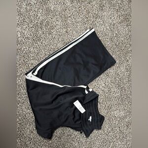 Women’s American eagle track pants . Black with white stripe on sides